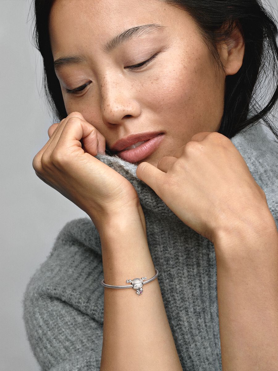 Girl with Teddy Bear Charm